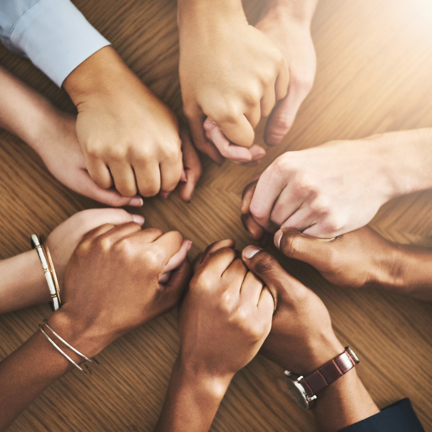 Community, Trust and Friends Holding Hands by Table at Group Counseling or  Session. Gratitude, Love and Top View of People in Circle for Praying Together for Religion, Community and Connect.